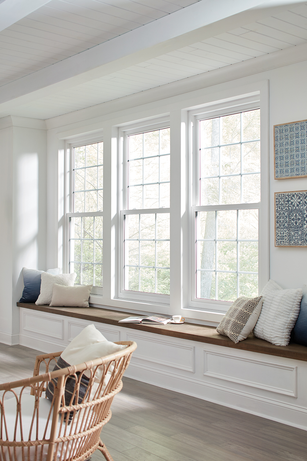 Regency Nordic White double hung windows with Nordic White colonial grids