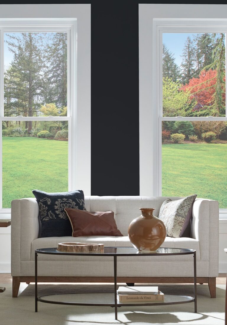 Regency 400 double-hung windows in a dining room/living room; Single prairie 5/8" flat grids white